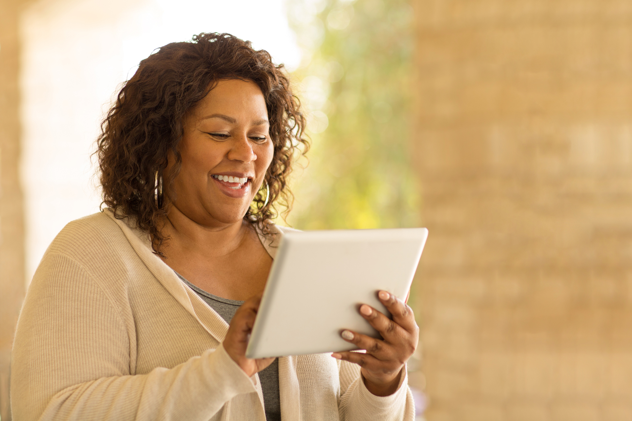 Mature woman working on a tablet